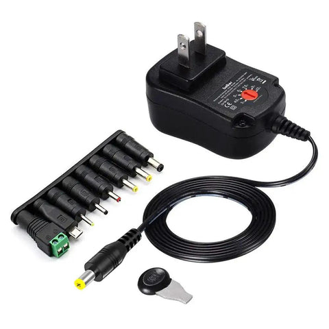Versatile 12W Universal ACDC Power Adapter With Eight Tip Sizes, Adjustable 3V to 12V DC Output, 1000mA Max, Micro USB Port shown