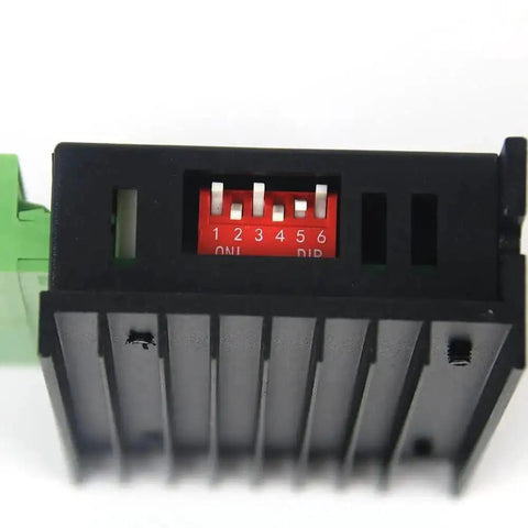 Close-up of 4 Pack Stepper Motor Driver Kit For Nema 17 23 34 CNC Controllers, showing dip switches for settings adjustment