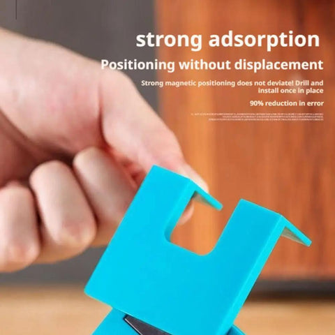 Close-up of blue magnetic door hinge jig held in hand, showcasing strong adsorption for quick drill free installation and precise hinge alignment.
