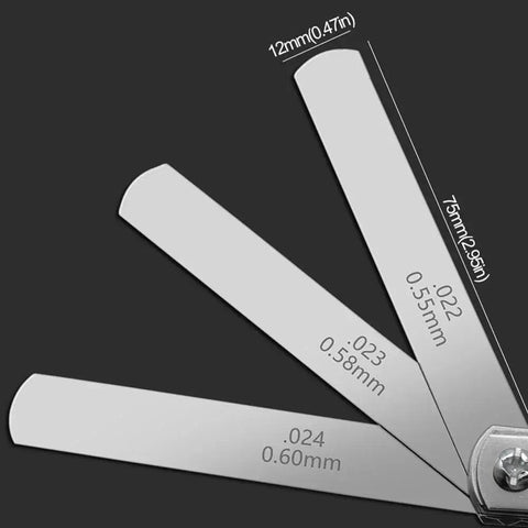 Close-up of open blades of 32 Blade Feeler Gauge Set Heavy Duty Stainless Steel Dual Marked Metric And SAE Foldable For Easy Carry Engine Tuning