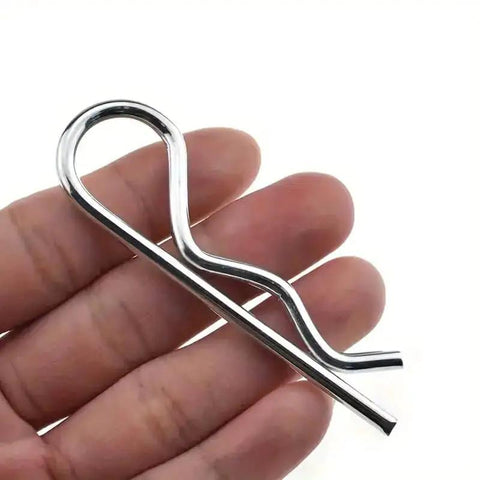 Close-up of a single M3 5x75mm white zinc-plated spring hitch cotter pin, part of 10 Pack Spring Hitch Cotter Hair Pins And White Zinc Plated Retaining Wire Clips For Trailers And Equipment, Cast Iron Pull Ring And Positioning Pin, Size M3 5x75mm, Rust Resistant, Built Tough, Reusable