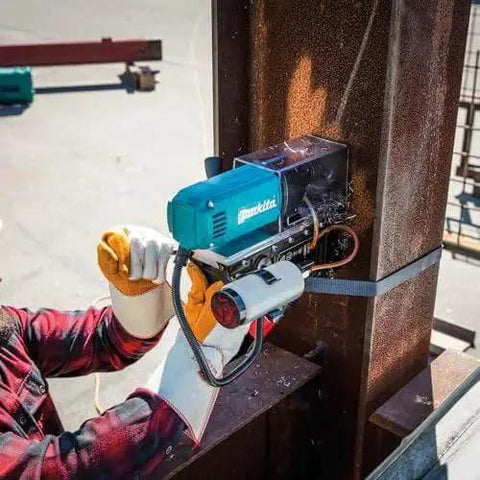 Portable Magnetic Drill For Steel With One And Three Eighths Inch Capacity And Two Inch Thick Cutting, installed on steel beam.