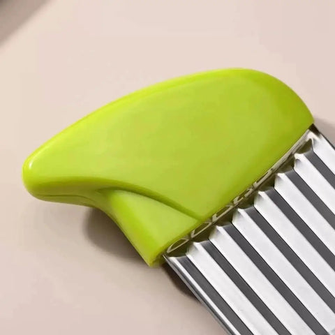 Close-up of two pack crinkle cutting tool with stainless steel wavy blade and green handle for potatoes carrots cucumbers and other veggies a durable ergonomic kitchen slicer that creates professional looking crinkle cuts every time.