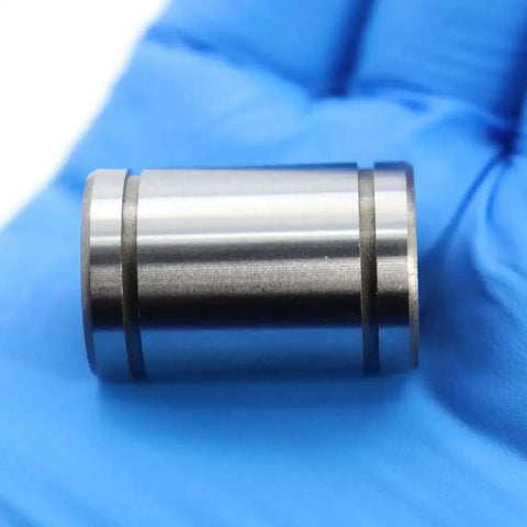 3D Printer Linear Bearing Set For JGAurora A5 A5S A1 A3S LM10UU Bearings 10x19x29mm shiny metal close-up on gloved hand