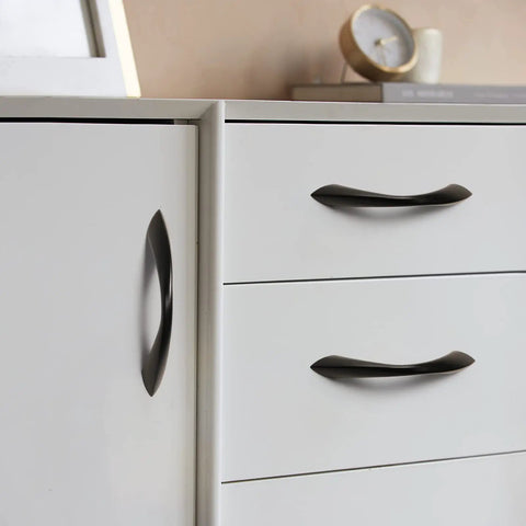 3 Inch Arch Twisted Matte Black Cabinet Pulls 10 Pack Heavy Duty Zinc Alloy Handles installed on white furniture