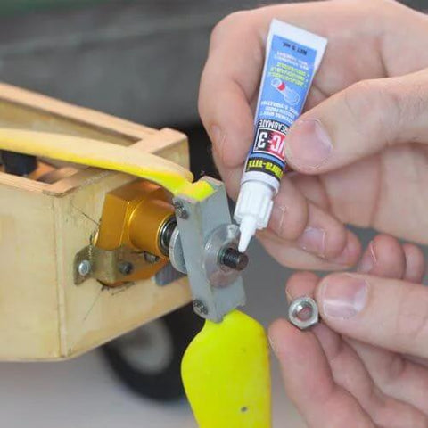 Applying VC-3 Threadmate Threadlocker Red 5mL Tube on metal and wood fastener to prevent loosening from shock and vibration.