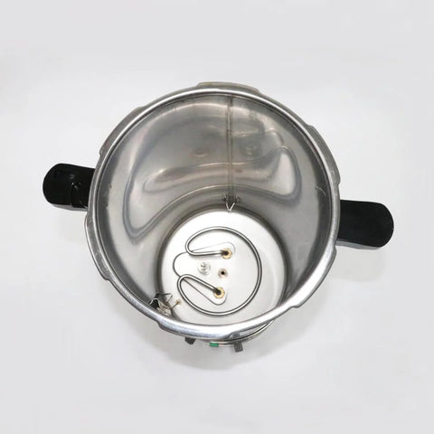 Top-down view of a stainless steel 24L lab autoclave interior with coil heater and black side handles.
