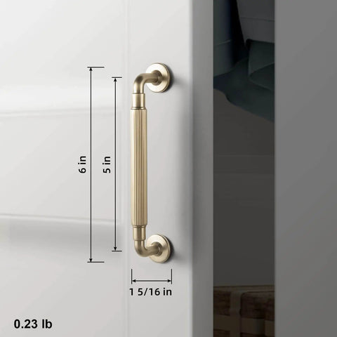 Champagne Bronze Reeded Cabinet Pulls Six Pack 5 Inch Sleek Modern Textured Drawer Handles installed on white cabinet door