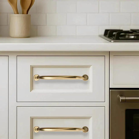 3 Inch Hole Center Brushed Brass Cabinet Pulls 10 Pack installed on white kitchen drawers, showing clean and modern look.