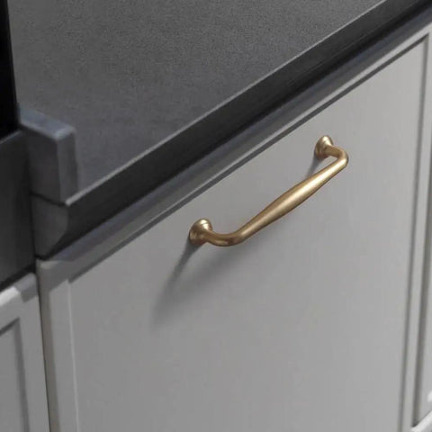 Six Pack 5 Inch Center To Center Modern Champagne Bronze Cabinet Pulls installed on kitchen cabinet