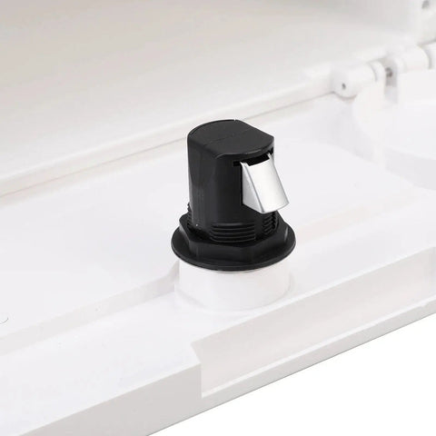 Boat glove box lock with concealed button latch; black housing and silver lever on white surface.