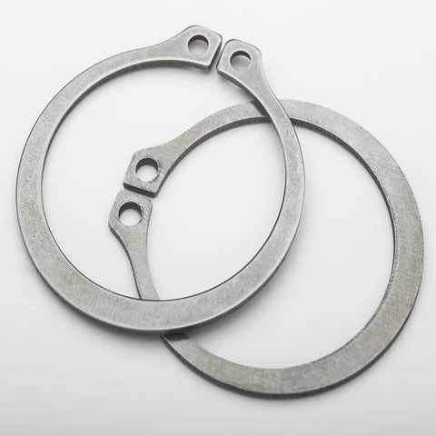 Close-up of External Retaining Ring Nine Sixteenths Inch Stainless Steel Pack Of 100 For Shafts 0.562 Inch Diameter Precision Groove