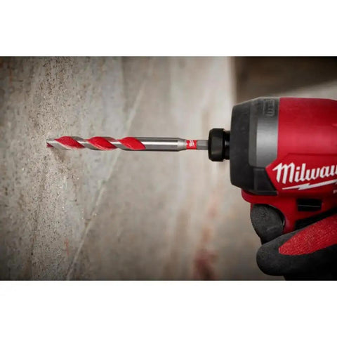 Shockwave Impact Duty 10 Piece Carbide Hammer Drill Bit Set For Concrete Block And Brick With One Quarter Inch Hex Shank 4X Faster Drilling Dynamic Cutting Edges Longer Life Milwaukee used in impact driver on concrete wall.