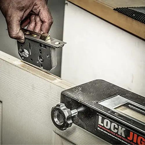 Pro Grade Lock Jig Kit For Routing Face Plate Recess And Mortise in use on door, showcasing mortise installation