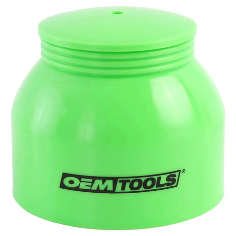 Green lid of Bearing Packer For Wheel Bearings Up To Three And A Half Inch Diameter With Transparent Grease Cup, mess-free tool for automotive use.