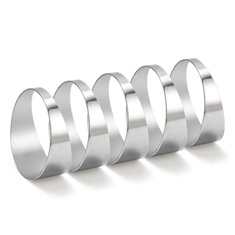 Five 304 Stainless Steel Pie Cuts 3 Inch Polished Deburred Exhaust Cutouts, shown from a side angle, in a row