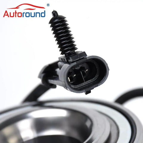 Close-up of Front Wheel Hub Bearing Assembly Kit 6 Lug 4WD AWD Drop In For 1999 To 2007 GM Trucks And SUVs Including Chevy Tahoe Silverado Suburban Express 1500 GMC Yukon Sierra Savana Cadillac Escalade ABS 2 Pack Replacement connector.