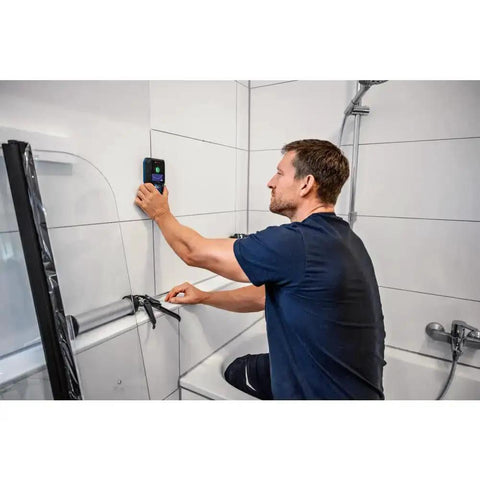 Electrician using Pro Grade Wall Scanner for Electricians And Contractors All In One Multi Function Stud Finder and Live Wire Detector