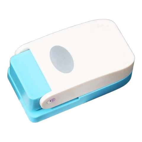 Dope Tiny Paper Punch Hole Puncher For Scrapbooking And Photo Albums, Oval Shape, Acrylic And Metal Cutter, shown in side view