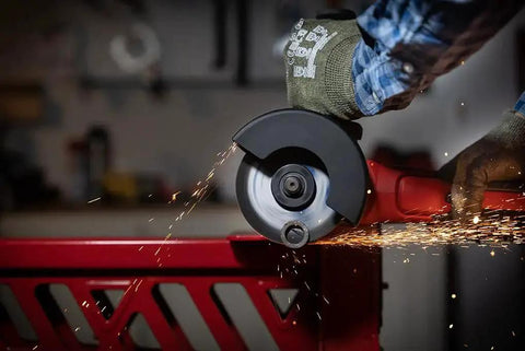Aggressive Four And A Half Inch Cut Off Wheels Pack Of Five For Angle Grinders General Purpose Cutting Discs With Norton Aluminum Oxide Grain And Proprietary Bond For Long Life And More Cuts Per Wheel When Cutting Metal And Stainless Steel in use on metal by angle grinder.