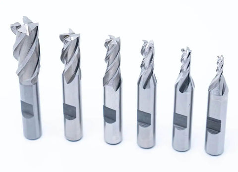 Center Cutting End Mill Set 6pc High Speed Steel 4 Flute Single End With 3/8 Inch Shank And Plastic Stand Includes 1/8, 3/16, 1/4, 5/16, 3/8, 1/2 Inch Mills For Precision Milling In Metal Wood And Plastic displayed in a row