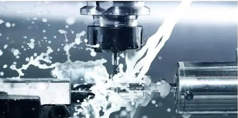 Beefy Straight Collet Milling Chuck Holder For MT4 ER32 Extension Rod in action, showcasing 40Cr construction with coolant spray flow.
