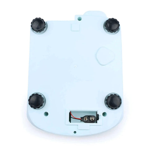 Bottom view of Digital Precision Lab Scale 15 Kg By 0.1 g Readability With 150 By 180 mm Stainless Steel Pan, showing feet and battery compartment.