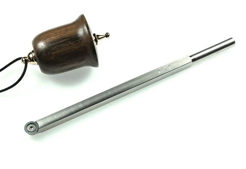 3 Carbide Wood Turning Tools Set With Rougher Finisher Detailer And 12 Inch Color Coded Solid Aluminum Lathe Tool Handles USA Made For Easy Tool Selection And No Fuss Pro Grade Woodturning Precision, close-up view with one detailed tool and wooden piece.