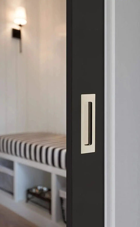 Modern Rectangular Flush Pull Handle In Flat Black Finish One And Three Quarters Inches Wide By Six Inches Long Sleek Minimalist Cabinet And Drawer Pull For Contemporary Kitchens And Bathrooms Durable Hardware With Hidden Mounting installed on a sliding door