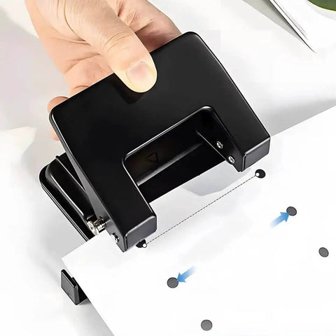 Heavy-Duty 2-Hole Punch Handheld Paper Punch for 20-Sheet Capacity With 50 Percent Less Effort and Built-In Waste Tray in use
