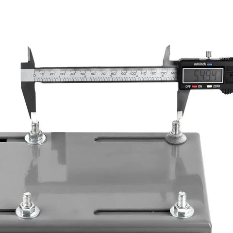 Close-up of 145T Frame Motor Slide Base for Worldwide Electric Motors Adjustable Mounting Plate with 5.5 by 5 inch pegs and caliper.