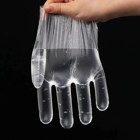 Close-up of clear disposable glove filled with water to show durability, Clear Plastic Disposable Gloves For Food Prep And Service Bulk 6000 Pcs