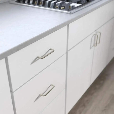 Solid Wire Cabinet Pulls Ultra Minimal Handles For Cupboards And Drawers, Satin Nickel Finish, installed on white kitchen cabinets