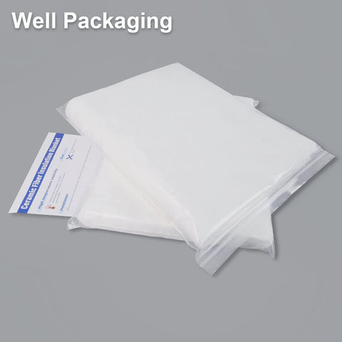 Two white ceramic fiber insulation blankets, 24x15.7x1 in, in clear plastic packaging
