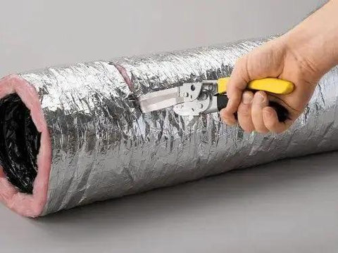 FDC3 Flex Duct Tool cutting flex duct with built-in wire cutter and double-edged knife blade, for fast pro-level installations.