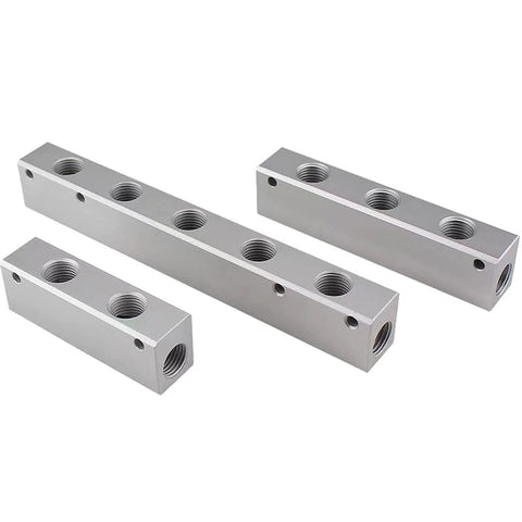 Pneumatic manifold blocks, set of four, aluminum alloy with G1/2 supply port and G1/4 output ports.