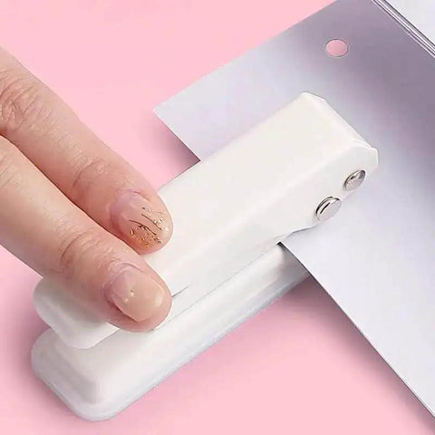 Using Heavy Duty Single Hole Puncher With One Quarter Inch Hole Twenty Sheet Capacity Metal Construction Skid Resistant Base
