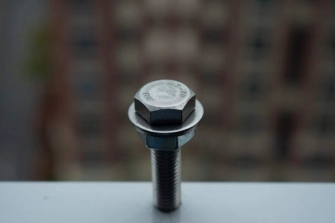 Front view of a 304 stainless hex bolt with flat washer.