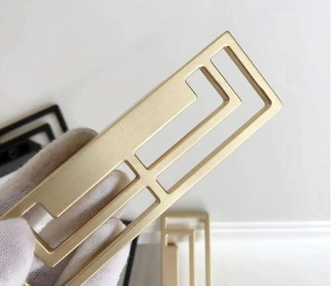 4 Pieces 3.93 Inch Gold Zinc Alloy Cabinet Handles With Hollow Geometric Design for drawers and closets, close-up view