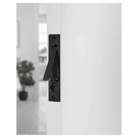 Edge Pull Latch Set For Barn Doors And Closets, Solid Forged Brass Handles In Matte Black, installed on white door