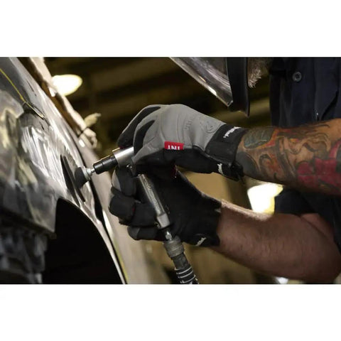 Person using Lightweight One Quarter Inch Right Angle Air Die Grinder With Twenty One Thousand RPM on metal surface
