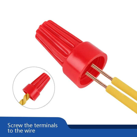 Red twist-on wire connector cap for electrical splice; two copper wires inserted.