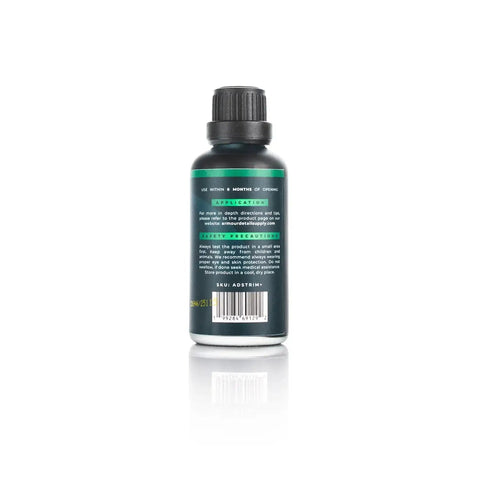 Back view of Trim And Exterior Plastic Restorer With UV Protection Up To 2 Years 50 Ml bottle showing label and barcode