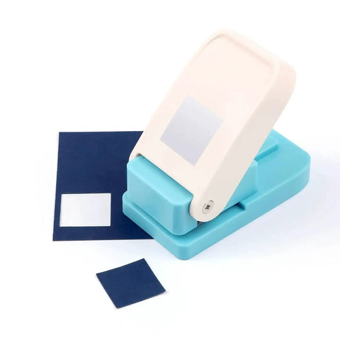 1 Inch Square Punch Lever Action Craft Punch for paper crafting and scrapbooking with blue base and paper cutouts