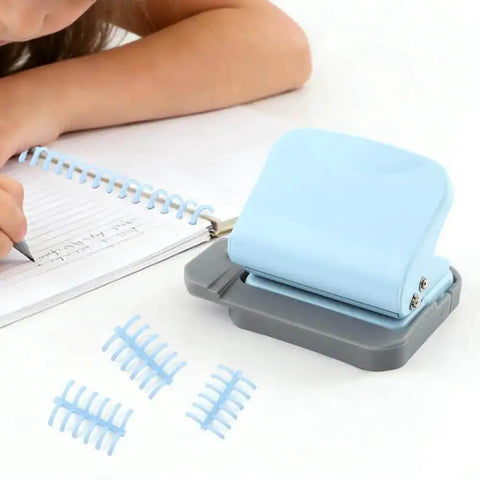 Six Hole Spiral Binding Punch For Planners And Home Office 8 Sheet Capacity Includes 20 Binder Rings shown with notebook.