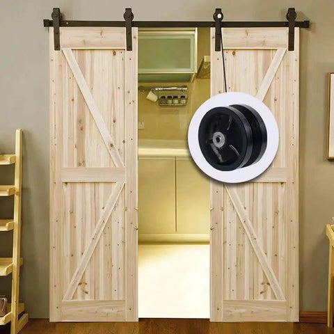 4 Inch By 1-1/2 Inch Cast Iron V Groove Caster Wheel With Straight Roller Bearing showcased in a barn door setting