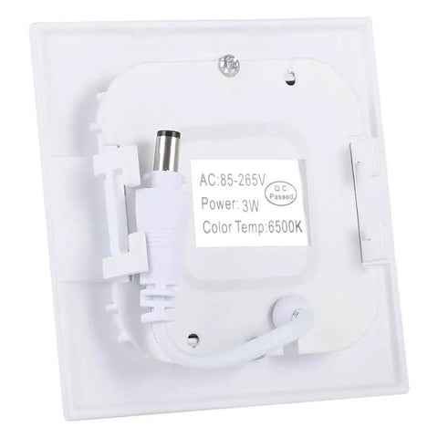 Back view of LED panel light showing power specifications and white cord