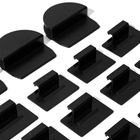 Black mounting clips for R1S Roof Sunshade Two Piece Full Blackout for Rivian R1S, arranged in a grid pattern.