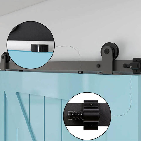 Five And Half Foot Sliding Barn Door Hardware Kit With Adjustable Floor Guide And Top Mount Track For Barn Wood Doors Durable Steel Construction With Nylon Wheel Hangers For Smooth Quiet Operation Frosted Black Finish Fits One And Three Eighths Inch Doors, close-up view of hardware installed on a blue wood door.