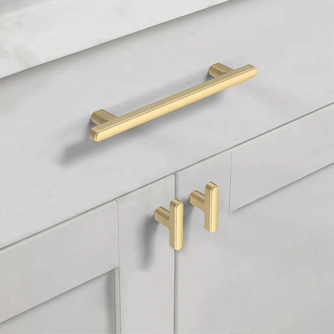 10 Pack 5 Inch Brushed Gold Cabinet Handles for Kitchen Cabinets and Drawers installed on white cabinet doors